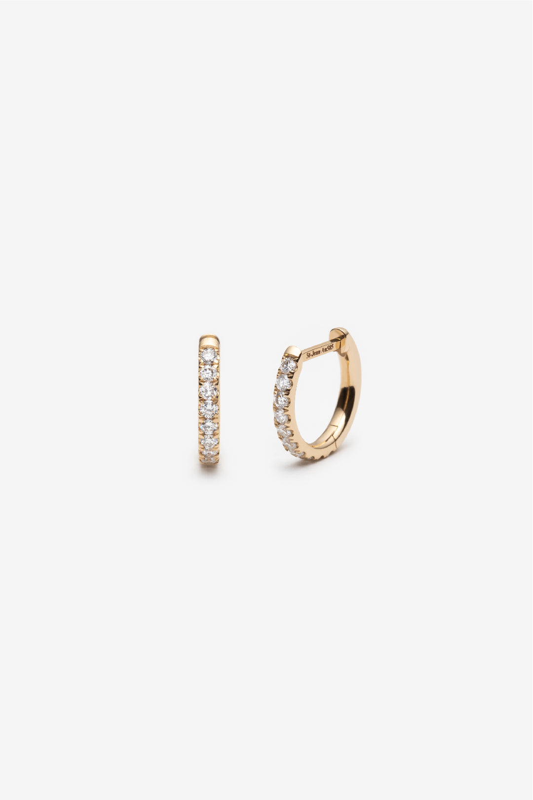 Boucles d'oreilles serties de diamants créé