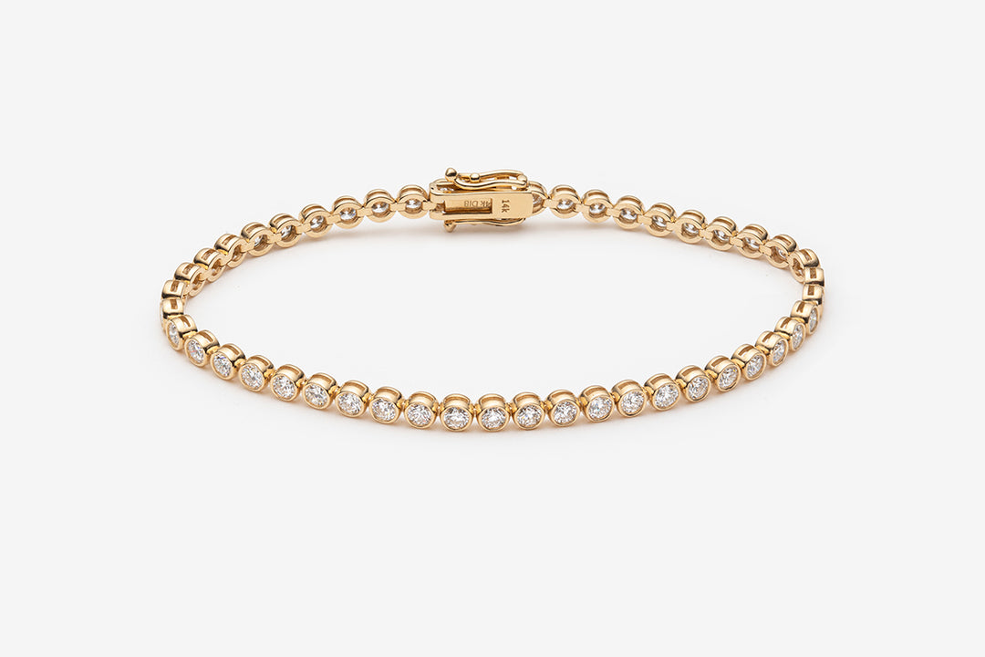 Bracelet tennis diamants serti clos